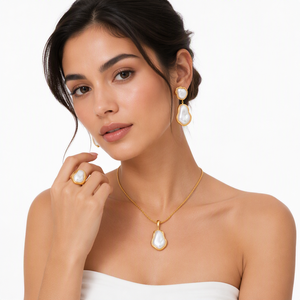 Parure de bijoux 3 pièces en acier inoxydable doré pour femme, avec collier et boucles d'oreilles en perles de forme irrégulière, collection 2026 - Product Image 1