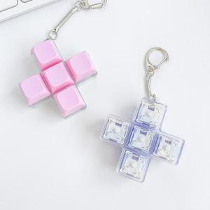 Nouveau design porte-clés en plastique à cinq touches croisées avec fonction anti-stress lumineuse et décompression, jouet sensoriel - Product Image 3