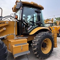 Chargeuse sur pneus rétrocaveuse JCB 3CX 4CX d'occasion, 4x4, état d'origine, mini-tracteur 4CX, roulement avant, moteur