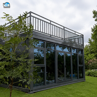 Maison préfabriquée avec mur en verre panoramique, grand balcon, fabriquée à partir de panneaux sandwich en conteneurs, maison modulaire mobile en conteneurs