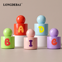 Flacon de parfum rond coloré personnalisé 30ml 50ml 100ml, flacon de parfum opaque ludique avec logo alphabet personnalisé et bouchon à bille