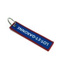 OEM ODM Usine Directe Écologique En Acier Inoxydable Tissé Porte-clés Double Face Bord Brodé Logo Personnalisé