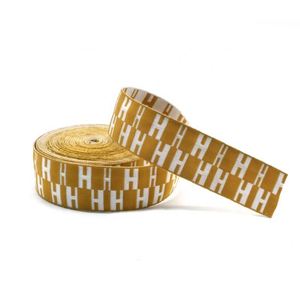 สายรัดผ้าแจ็คการ์ดไนลอนคุณภาพสูง 100% ลายตาข่าย เคลือบสะท้อนแสง ได้รับการรับรองมาตรฐาน Oeko-Tex ปรับแต่งความกว้างได้สำหรับกระเป๋า - Product Image 1