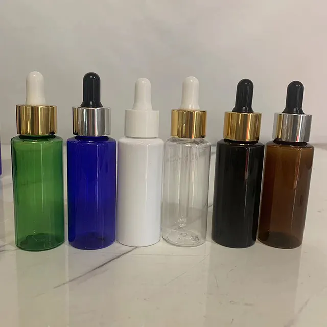 Hengjian Manufacturer Empty 50ml Amber Cosmetic Serum Essential Oil Plastic Dropper Bottle For Massage Oil With Glass Pipette