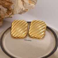 Bijoux de mode africains en gros, boucles d'oreilles géométriques personnalisées pour femmes, boucles d'oreilles en acier inoxydable martelé, boucles d'oreilles vintage