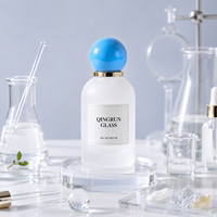 Flacon de parfum en verre givré de 30 ml, 50 ml, 100 ml avec bouchon à bille bleu et pompe pulvérisatrice pour l'emballage de parfums
