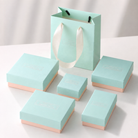Boîte d'emballage de bijoux bleu pastel rose, boîte cadeau en papier argenté pour bague, boucles d'oreilles, collier, bracelet avec insert en mousse, vente en gros