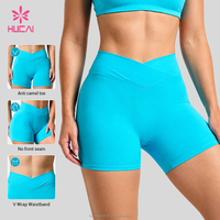 Shorts de yoga et de sport HUCAI personnalisés à taille croisée, séchage rapide, effet push-up, sans couture avant, taille haute pour femme