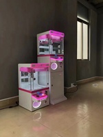 Vente en gros usine : Machine à griffes à thème pêcheurs de dattes rose de haute qualité - Jeu d'arcade à monnayeur pour la capture de peluches, idéal pour les centres commerciaux