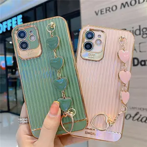 luxury design women pretty phone case with heart wrist chain mobile phone back cover case for iphone 12 13 pro max