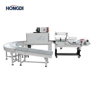 Machine d'emballage thermorétractable entièrement automatique pour cartons en plastique, bouteilles alimentaires, système de scellage en L - Product Image 1