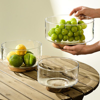 Assiette de fruits en verre de style classique avec base en bois Collations rondes durables et plat de noix pour salon en verre
