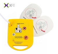 Dernier modèle – Mini simulateur AED portable XFT-D0009 approuvé CE pour la formation en RCP, alimenté électriquement, conforme aux lignes directrices AHA