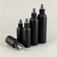 Flacon en aluminium noir mat de 100 ml avec bouchon en plastique et pompe pulvérisatrice pour huile aromatique, huile essentielle