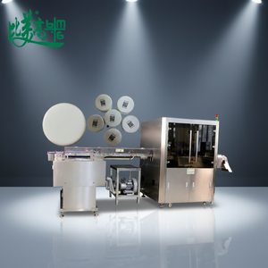 Machine de codage et de détection laser de codes QR d'identité unique pour le contrôle qualité des bouchons de bouteilles de lait et la traçabilité complète de la chaîne de production - Product Image 1