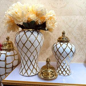 Jarrones de porcelana modernos y de lujo para decoración del hogar, jarrones de suelo <span class=keywords><strong>blanco</strong></span> y dorado acanalado de cerámica, tarros de jengibre - Product Image 1