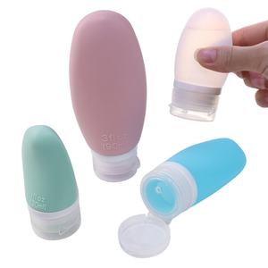 Moule de bouteille personnalisé de 2oz approuvé par le TSA bouteille de lotion de toilette de voyage en silicone portable bouteille de shampooing rechargeable à presser pour voyage - Product Image 1