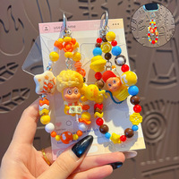 Accessoire de sac DIY : Petit pendentif en forme d'étoile, figurine de poupée, décoration de porte-clés, chaîne de téléphone portable perlée, style dessin animé tendance