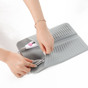 Almohadilla de Silicona 2 en 1, Práctica y Portátil, con Bolsa de Almacenamiento y Botones, Producto Nuevo para Rizadores de Pelo - Product Image 2