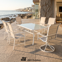 Ensemble de salle à manger d'extérieur J&M 4 pièces en fer forgé, table de café durable et chaises de patio avec plateau en verre