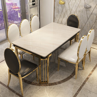Ensemble de table et chaises de salle à manger de luxe moderne avec plateau en marbre, structure en acier inoxydable, imperméable, design rectangulaire 8 places