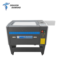 Vente flash : Mini machine de gravure laser CO2 4060, système de découpe laser compact pour bois, bambou, acrylique, tissu, avec refroidisseur d'eau