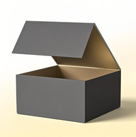 Boîte-cadeau pliante en carton rigide en forme de livre noir de luxe imprimée sur mesure avec gaufrage de stratification mate pour l'emballage de crème pour le visage