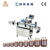 Machine d'étiquetage entièrement automatique à alimentation par rouleaux pour les aliments en conserve, la confiture et les bouteilles de vin rouge