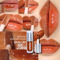 Gloss à lèvres repulpant et hydratant, teinte nude crémeuse, couleur intense, fini miroir haute brillance, cosmétique pour les lèvres