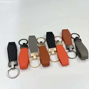 Nouveau <span class=keywords><strong>porte</strong></span>-<span class=keywords><strong>clés</strong></span> en métal en cuir de voiture avec LOGO personnalisable <span class=keywords><strong>porte</strong></span>-<span class=keywords><strong>clés</strong></span> en alliage de zinc pour accessoire pendentif cadeau promotionnel - Product Image 6