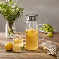 Carafe en verre borosilicate écologique de 1,5 L avec couvercle en acier inoxydable et poignée en verre, résistante à la chaleur, pour boissons chaudes/froides et thé glacé