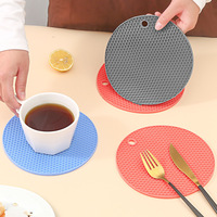 Sous-plat rond en silicone résistant à la chaleur et imperméable, texture nid d'abeille, antiadhésif, protection de table avec trou de suspension pour ustensiles de cuisine