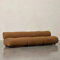 Le canapé modulaire combiné en tissu de laine d'agneau de style rétro Meilade, au design simple, est un canapé moderne du milieu du siècle.