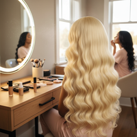 La perruque dorée de style bob en cheveux naturels indiens a une densité de 180 %. Il peut être permanentisé et coloré. Il présente de grandes dimensions