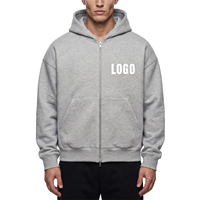 Vente en gros de sweats à capuche Essentials pour hommes, vierges, personnalisables avec logo, en coton épais 400 GSM gris chiné, coupe ample et tombante, avec fermeture éclair bidirectionnelle