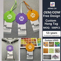 Étiquettes suspendues en papier de luxe personnalisées avec découpe de forme et texture gaufrée, étiquettes de vêtements pour marque de mode OEM ODM MOQ 100 PIÈCES