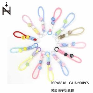 Portachiavi con corda a forma di faccina sorridente, anello elastico colorato per chiavi e borse, 600 pezzi per scatola - Product Image 1