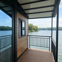 Maisonnette préfabriquée moderne de luxe en conteneur d'acier extensible, étanche, résistante au feu, avec terrasse, porte vitrée, chambre et appartement, facile à assembler