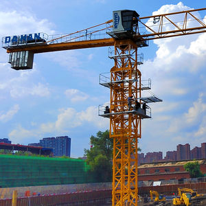 מנוף צריח שטוח דגם דאהן QTZ250 דגם 7025-12T עם בקר PLC ומנוע, כושר הרמה 12 טון, טווח 70 מטר, מומנט הרמה 250 טון.מטר לבנייה - Product Image 1