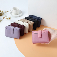 Dompet wanita, gesper warna polos, pemegang kartu Rfid, dengan saku koin ritsleting