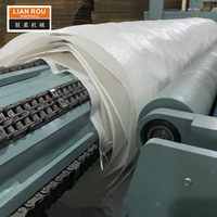 Nouvelle machine électrique automatique pour l'emballage en rouleau, le remplissage de liquides, le scellage et le compressage de matelas fins à ressorts ensachés en plastique