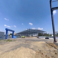 Structure en acier robuste, bâtiment d'entrepôt préfabriqué en acier industriel, traitement de surface galvanisé, garantie de 5 ans