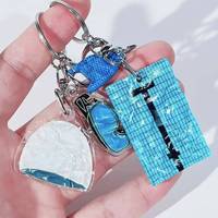Porte-clés fantaisie sur le thème de la natation, porte-clés en acrylique transparent avec motif d'ondulations d'eau, fermoir mousqueton, pendentif de sac tendance