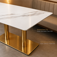 Table de restaurant rectangulaire avec plateau en pierre frittée, base à double poteau en laiton, résistante aux rayures et à la chaleur