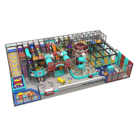 Centre de jeux intérieur pour enfants avec projecteur interactif, trampoline et aire de jeux designée sur mesure.