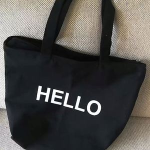 Sac fourre-tout promotionnel pliable en toile de coton noir avec impression de lettres - Product Image 3