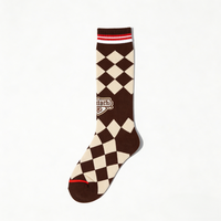 Chaussettes de football en nylon et élasthanne de qualité supérieure avec panneaux de ventilation en maille ciblée pour un refroidissement optimal pendant l'entraînement et les matchs estivaux
