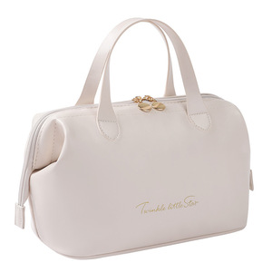 Nuovo Modello 2026 Borsa da Viaggio per Cosmetici e Articoli da Bagno, Astuccio per Trucchi da Donna, Grande Capacità, Portatile, in PU con Fiocco, Cerniera e Manico Morbido, Tendenza Moda - Product Image 1