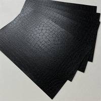 Feuille de papier gaufré effet crocodile noir 120 g/m², recto brillant, papier spécial cartonné