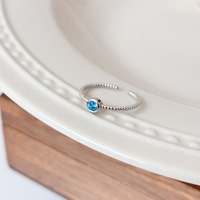 Bague fine ajustable en argent sterling 925 avec zircon bleu et motif corde torsadée